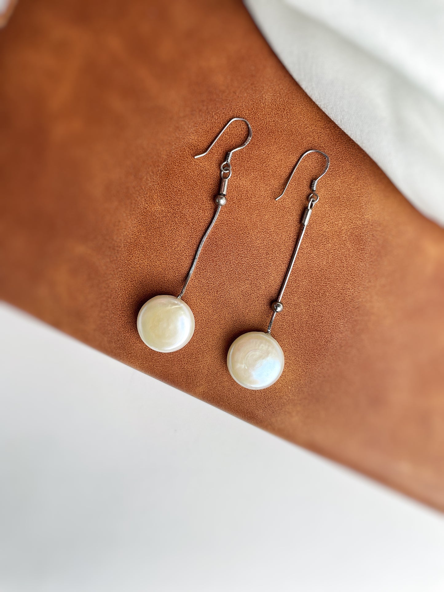 Sleek Silver Teardrop Pearl Earrings