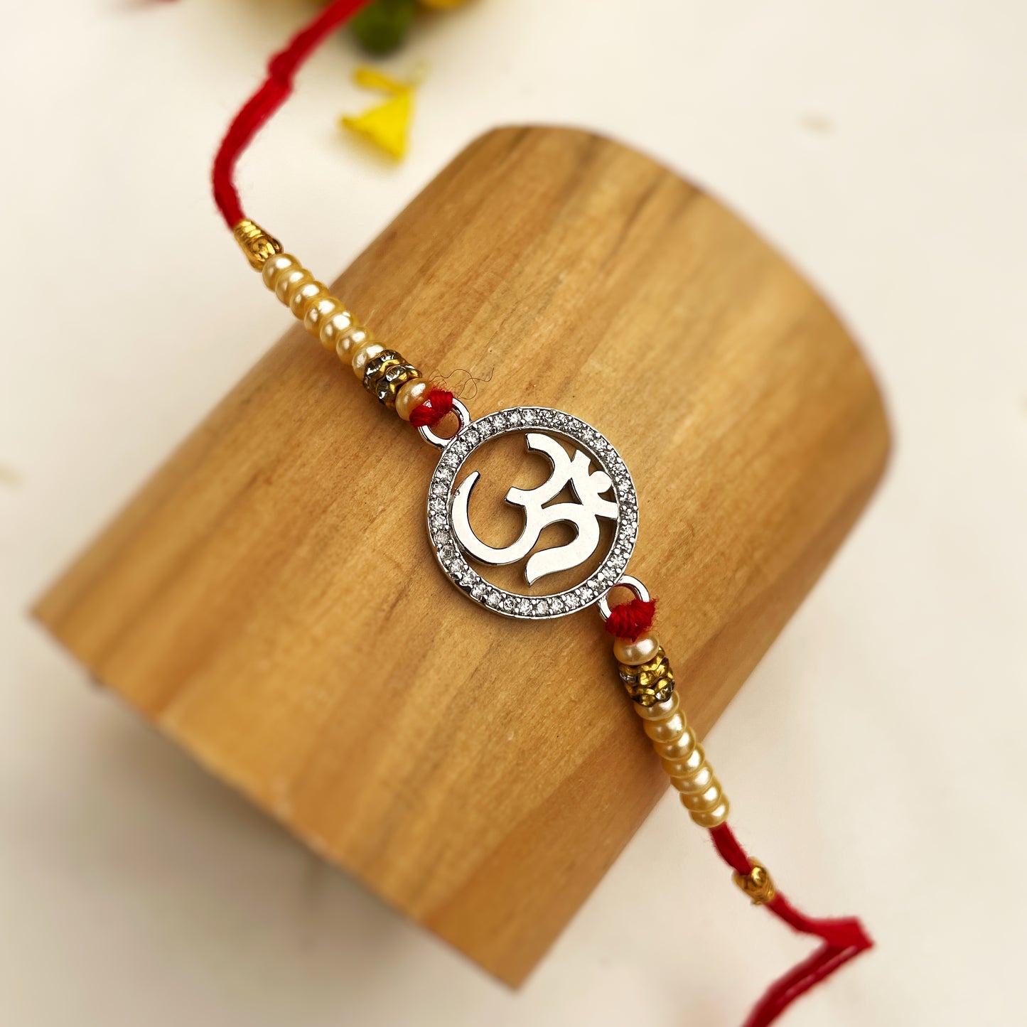 Silver Om Sphere Rakhi