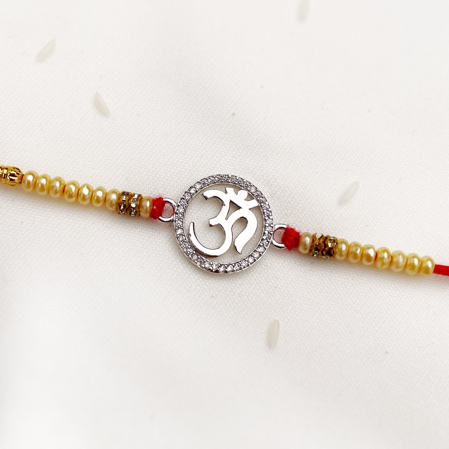 Silver Om Sphere Rakhi