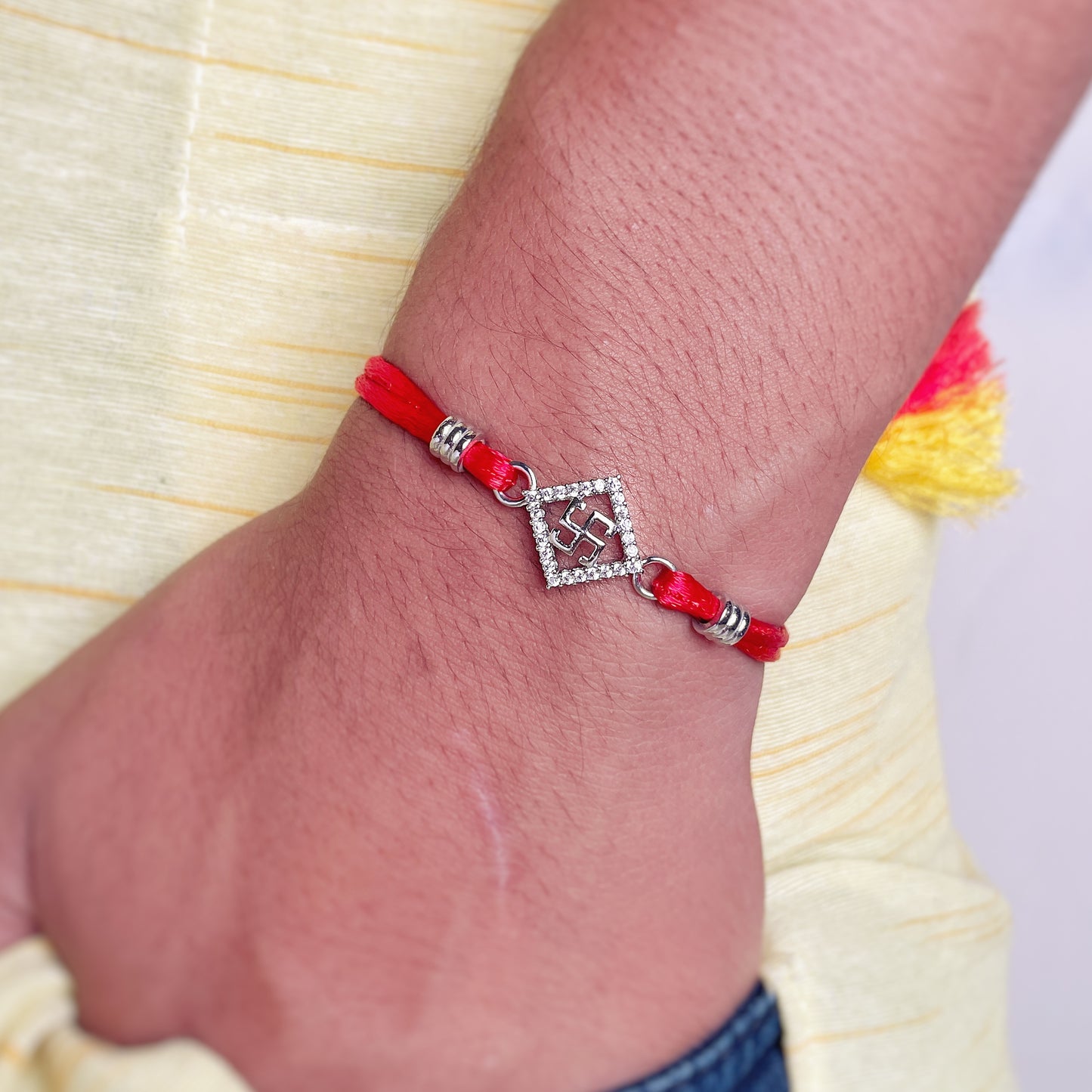 Silver Blissful Swastik Lumba Rakhi