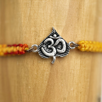 Oxidized Om in Leaf Rakhi