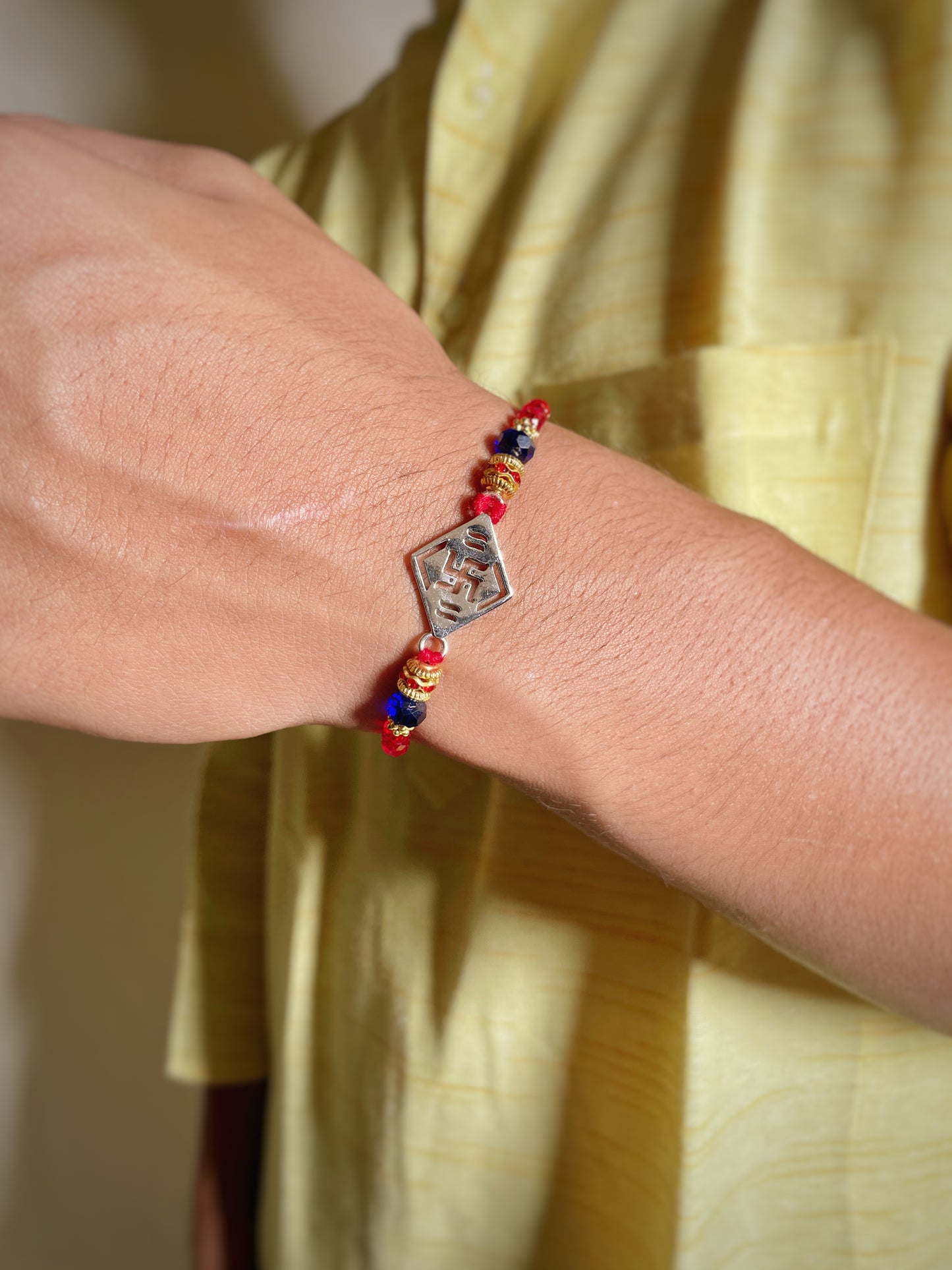 Silver Swastik Rakhi