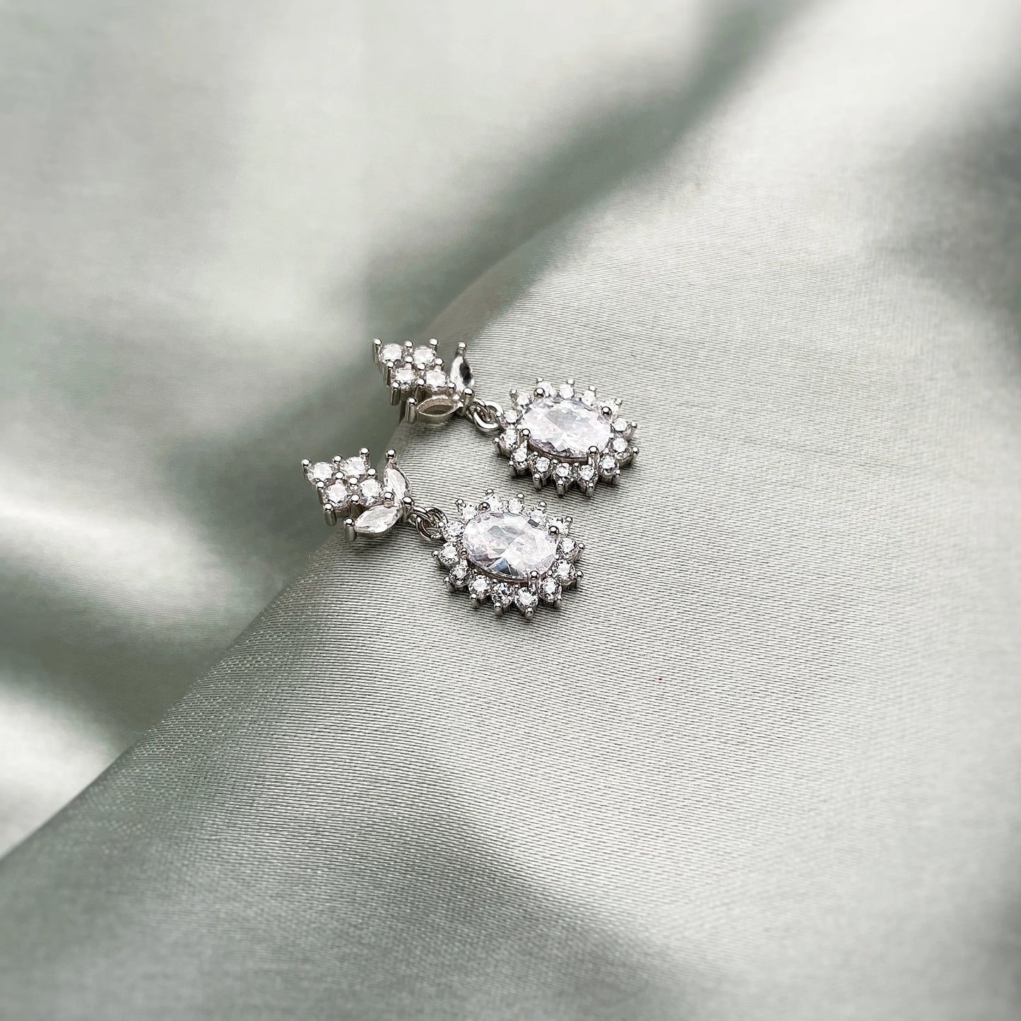 Teardrop Cut Diamond Silver Earrings